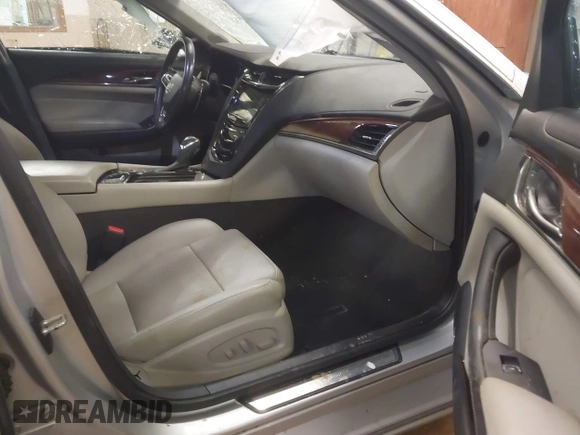 2014 Cadillac CTS Luxury AWD with VIN 1G6AX5S3XE0158960, listed as a IAAI auction lot 41258609 with 84,360 mi miles and . Bid and sale history available at DreamBid. Image 5.