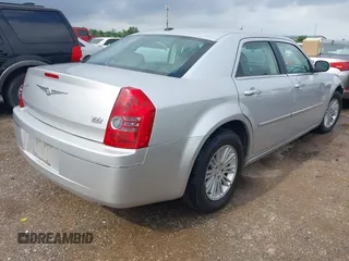 2010 Chrysler 300 Touring with VIN 2C3CA5CV1AH272993, listed as a IAAI auction lot 42154073 with 224,685 mi miles and . Bid and sale history available at DreamBid. Image 4.