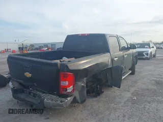2013 Chevrolet Silverado 1500 LT with VIN 3GCPCSE00DG141940, listed as a IAAI auction lot 41882612 with Not Provided miles. Bid and sale history available at carsss.com. Image 6.