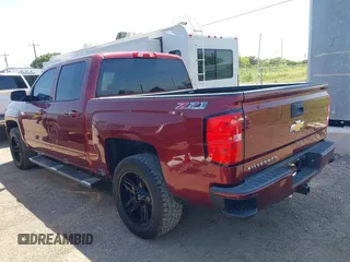 2017 Chevrolet Silverado 1500 LT with VIN 3GCUKREC8HG259071, listed as a IAAI auction lot 42078117 with 158,606 mi miles and . Bid and sale history available at DreamBid. Image 3.