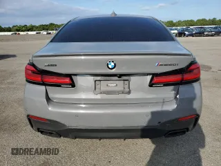 2022 BMW 5 Series M550i xDrive z VIN WBA13BK00NCJ03264, wystawiony jako Copart lot #68976084 z przebiegiem 39 515 mil mil oraz Szkoda całkowita • Salvage title. Historia ofert i sprzedaży dostępna na DreamBid. Obrazek 6.