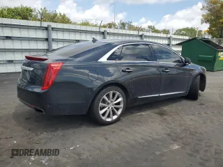 2013 Cadillac XTS Luxury with VIN 2G61R5S34D9101006, listed as a Copart auction lot 51241485 with 143,522 mi miles and Clean Title. Bid and sale history available at DreamBid. Image 3.