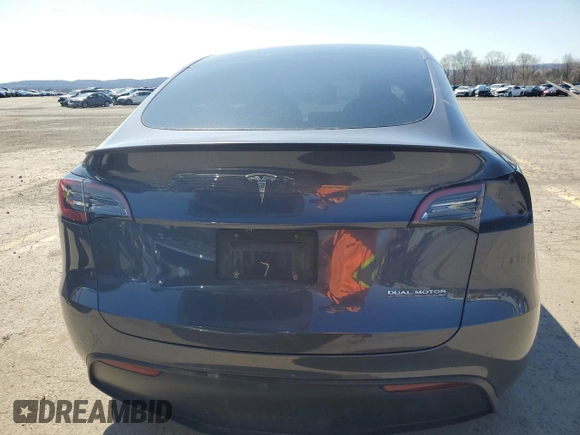 2023 Tesla Model Y Performance z VIN 7SAYGDEF9PF865129, wystawiony jako Copart lot #50228735 z przebiegiem Nie podano mil oraz Szkoda całkowita • Salvage title. Historia ofert i sprzedaży dostępna na DreamBid. Obrazek 6.