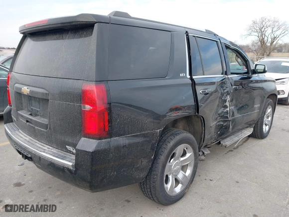 2016 Chevrolet Tahoe LTZ with VIN 1GNSKCKC9GR217166, listed as a IAAI auction lot 41152096 with 133,589 mi miles. Bid and sale history available at carsss.com. Image 4.