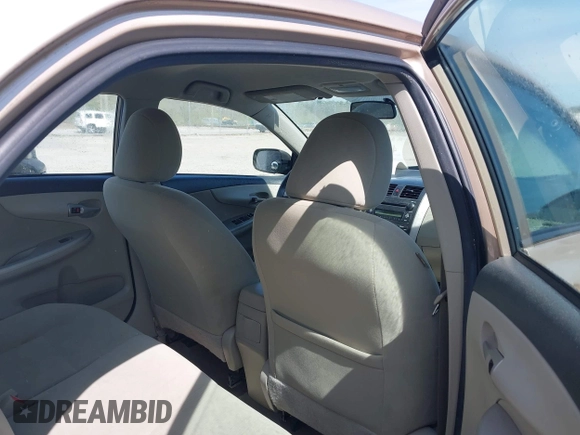 2011 Toyota Corolla L with VIN 2T1BU4EE1BC547635, listed as a IAAI auction lot 42053236 with 121,485 mi miles. Bid and sale history available at carsss.com. Image 8.