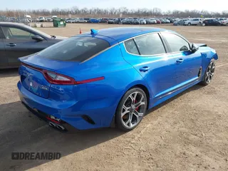 2020 Kia Stinger GT1 with VIN KNAE45LCXL6074179, listed as a IAAI auction lot 41718721 with 58,092 mi miles. Bid and sale history available at carsss.com. Image 4.