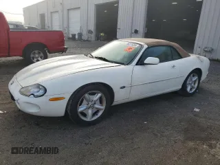 1997 Jaguar XK with VIN SAJGX2744VC017485, listed as a Copart auction lot 86275204 with Not Provided miles and Salvage Title. Bid and sale history available at DreamBid. Image 1.