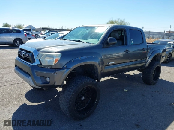 2014 Toyota Tacoma PreRunner with VIN 3TMJU4GN3EM165840, listed as a IAAI auction lot 41666871 with 150,333 mi miles and . Bid and sale history available at DreamBid. Image 18.