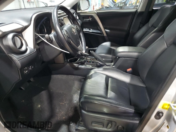2016 Toyota RAV4 Limited with VIN JTMDJREV4GD028877, listed as a Copart auction lot 83225434 with 90,502 mi miles and Salvage title. Bid and sale history available at DreamBid. Image 7.