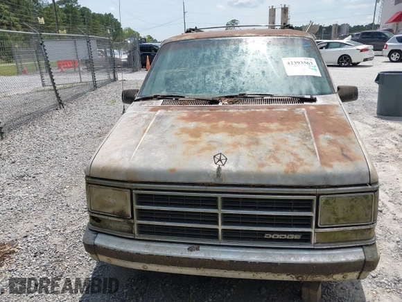 1987 Dodge Caravan z VIN 2B4FK41G3HR127301, wystawiony jako IAAI lot #42393563 z przebiegiem Nie podano mil oraz . Historia ofert i sprzedaży dostępna na DreamBid. Obrazek 6.