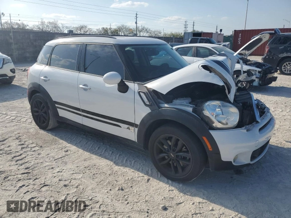 2012 MINI Countryman S with VIN WMWZC5C51CWL57074, listed as a Copart auction lot 53386715 with 55,857 mi miles and Salvage Title. Bid and sale history available at DreamBid. Image 4.