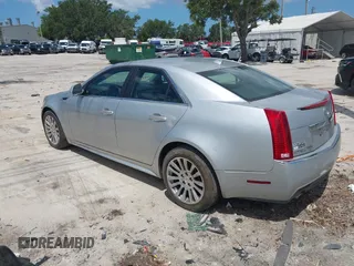 2012 Cadillac CTS with VIN 1G6DC5E53C0157278, listed as a IAAI auction lot 42425392 with 151,991 mi miles and . Bid and sale history available at DreamBid. Image 3.