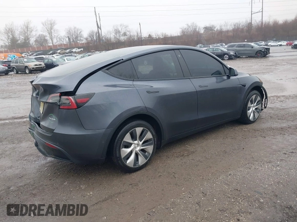 2022 Tesla Model Y Long Range z VIN 7SAYGDEE9NF331410, wystawiony jako IAAI lot #41580172 z przebiegiem 81 794 mil mil oraz . Historia ofert i sprzedaży dostępna na DreamBid. Obrazek 4.