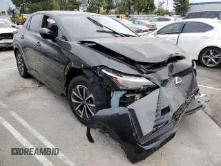 2024 Lexus RZ 450e Premium with VIN JTJAAAABXRA026441, listed as a Copart auction lot 82375054 with Not provided miles and Salvage title. Bid and sale history available at DreamBid. Image 4.