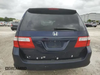 2007 Honda Odyssey LX with VIN 5FNRL382X7B054326, listed as a Copart auction lot 58912205 with 168,994 mi miles and Clean title. Bid and sale history available at DreamBid. Image 6.