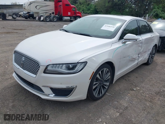 2019 Lincoln MKZ Hybrid Reserve II z VIN 3LN6L5MUXKR632126, wystawiony jako IAAI lot #42186526 z przebiegiem 130 364 mil mil oraz . Historia ofert i sprzedaży dostępna na DreamBid. Obrazek 2.