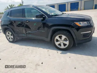2018 Jeep Compass Latitude with VIN 3C4NJDBB1JT261988, listed as a Copart auction lot 60912235 with 67,929 mi miles and Salvage title. Bid and sale history available at DreamBid. Image 4.