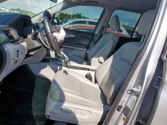 2021 Honda Ridgeline RTL-E with VIN 5FPYK3F73MB008806, listed as a Copart auction lot 62234825 with 84,716 mi miles and Salvage title. Bid and sale history available at DreamBid. Image 7.