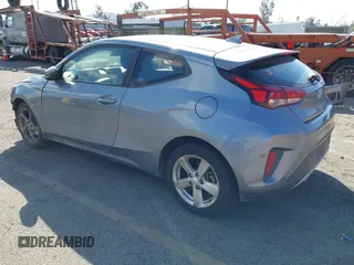 2019 Hyundai Veloster 2.0 with VIN KMHTG6AF8KU019854, listed as a IAAI auction lot 41697113 with 123,851 mi miles. Bid and sale history available at carsss.com. Image 3.
