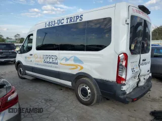 2021 Ford Transit with VIN 1FDAX2CG2MKA23709, listed as a Copart auction lot 74054214 with 105,503 mi miles and Salvage Title. Bid and sale history available at DreamBid. Image 2.