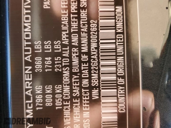 2023 McLaren GT z VIN SBM22GCAXPW002692, wystawiony jako Copart lot #41496504 z przebiegiem Nie podano mil oraz . Historia ofert i sprzedaży dostępna na DreamBid. Obrazek 14.