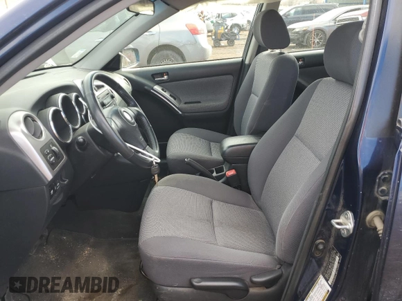 2006 Toyota Matrix STD z VIN 2T1LR30EX6C563460, wystawiony jako Copart lot #43759795 z przebiegiem 121 199 mil mil oraz Szkoda całkowita • Salvage title. Historia ofert i sprzedaży dostępna na DreamBid. Obrazek 7.