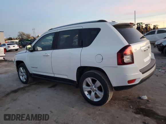2014 Jeep Compass Latitude with VIN 1C4NJCEB0ED708098, listed as a Copart auction lot 81561334 with 105,687 mi miles and Salvage Title. Bid and sale history available at carsss.com. Image 2.