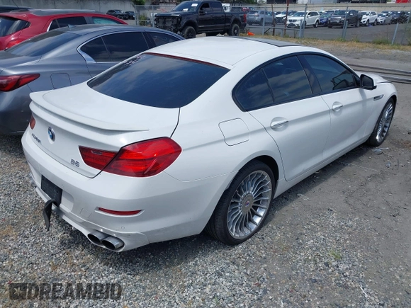 2015 BMW 6 Series 650i xDrive with VIN WBA6B4C53FD899938, listed as a IAAI auction lot 41761114 with 93,015 mi miles and . Bid and sale history available at carsss.com. Image 4.