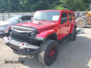 2022 Jeep Wrangler Unlimited Rubicon with VIN 1C4HJXFG0NW100620, listed as a IAAI auction lot 42534993 with 21,614 mi miles and . Bid and sale history available at DreamBid. Image 2.