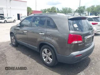 2013 Kia Sorento EX with VIN 5XYKU3A69DG318488, listed as a IAAI auction lot 42618875 with 221,080 mi miles and . Bid and sale history available at DreamBid. Image 3.