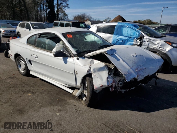 1997 Ford Mustang with VIN 1FALP4041VF194986, listed as a Copart auction lot 78841404 with 118,936 mi miles and Salvage Title. Bid and sale history available at carsss.com. Image 4.