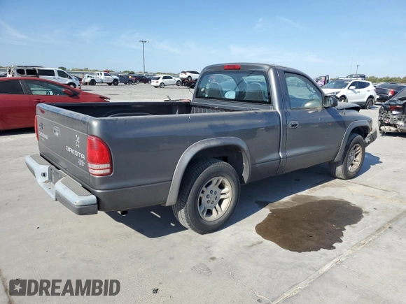 2003 Dodge Dakota with VIN 1D7FL16X13S189963, listed as a Copart auction lot 77114344 with 100,127 mi miles and Salvage Title. Bid and sale history available at carsss.com. Image 3.