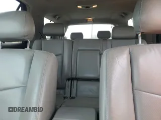 2009 Cadillac SRX RWD z VIN 1GYEE637990137951, wystawiony jako Copart lot #47473825 z przebiegiem 188 592 mil mil oraz Czysty tytuł • Clean title. Historia ofert i sprzedaży dostępna na DreamBid. Obrazek 10.
