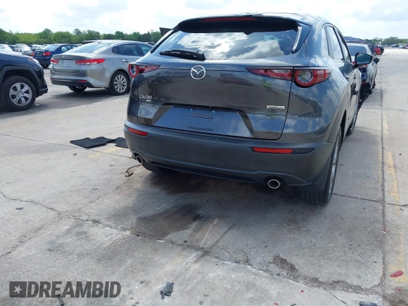2021 Mazda CX-30 Select with VIN 3MVDMBBL2MM261169, listed as a IAAI auction lot 41938783 with 74,996 mi miles. Bid and sale history available at carsss.com. Image 16.