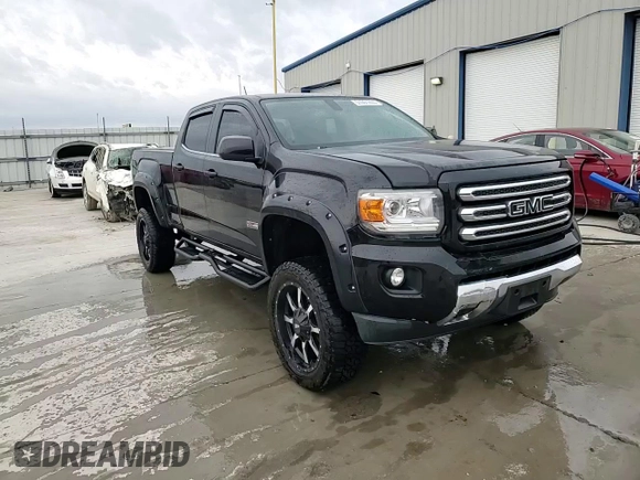 2015 GMC Canyon 4WD SLE with VIN 1GTG6BE30F1185696, listed as a Copart auction lot 51091255 with 173,322 mi miles and Salvage Title. Bid and sale history available at carsss.com. Image 13.