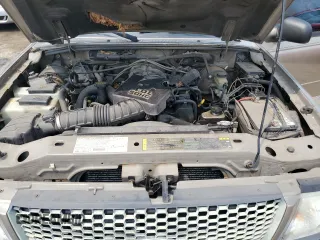 2003 Ford Ranger XL Fleet z VIN 1FTZR45E13PB20412, wystawiony jako Copart lot #60357605 z przebiegiem 190 398 mil mil oraz Czysty tytuł • Clean title. Historia ofert i sprzedaży dostępna na DreamBid. Obrazek 11.