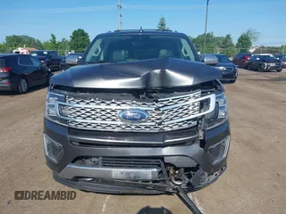 2021 Ford Expedition Max Platinum with VIN 1FMJK1MT8MEA66311, listed as a IAAI auction lot 42450429 with 95,732 mi miles and . Bid and sale history available at DreamBid. Image 12.