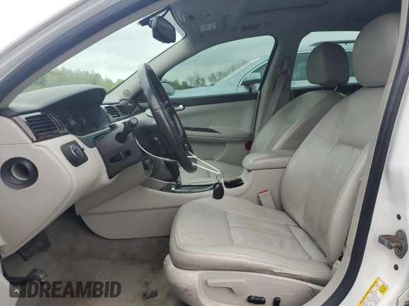 2014 Chevrolet Impala LTZ with VIN 2G1WC5E37E1118049, listed as a Copart auction lot 55802325 with 228,385 mi miles and Clean Title. Bid and sale history available at DreamBid. Image 7.