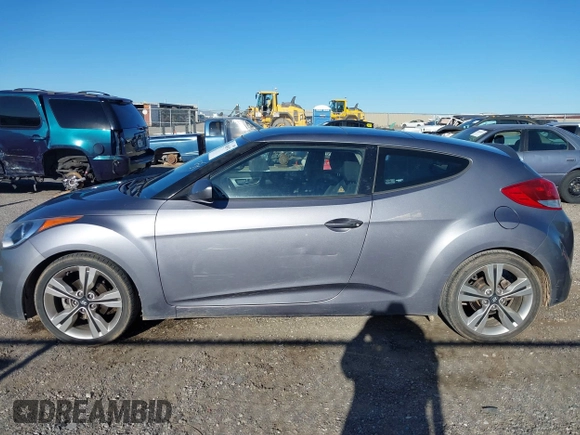 2017 Hyundai Veloster with VIN KMHTC6AD9HU323472, listed as a IAAI auction lot 41865974 with 94,692 mi miles. Bid and sale history available at carsss.com. Image 14.