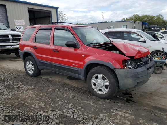 2002 Ford Escape XLT Choice with VIN 1FMCU04132KB16848, listed as a Copart auction lot 55266595 with 205,451 mi miles and Salvage title. Bid and sale history available at DreamBid. Image 4.