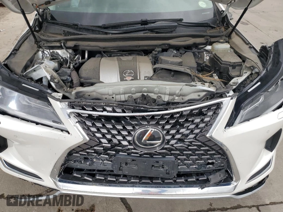 2021 Lexus RX 350 with VIN JTJHZMDA7M2051652, listed as a Copart auction lot 57218985 with 17,013 mi miles and Salvage title. Bid and sale history available at DreamBid. Image 12.