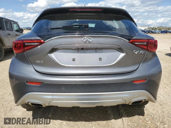 2017 Infiniti QX30 Premium with VIN SJKCH5CR4HA019019, listed as a Copart auction lot 63316445 with 83,712 mi miles and Salvage title. Bid and sale history available at DreamBid. Image 6.