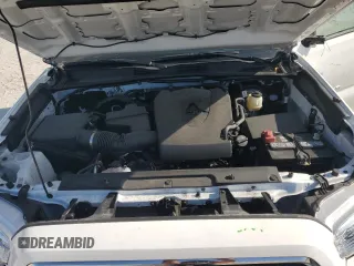2023 Toyota Tacoma SR5 z VIN 3TMAZ5CN3PM212056, wystawiony jako Copart lot #57217735 z przebiegiem 36 533 mil mil oraz Szkoda całkowita • Salvage title. Historia ofert i sprzedaży dostępna na DreamBid. Obrazek 11.