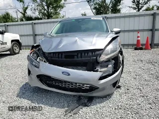 2021 Ford Escape SE z VIN 1FMCU0G64MUA91313, wystawiony jako Copart lot #56318425 z przebiegiem Nie podano mil oraz Szkoda całkowita • Salvage title. Historia ofert i sprzedaży dostępna na DreamBid. Obrazek 14.