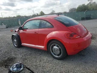 2012 Volkswagen Beetle 2.5L PZEV with VIN 3VWHP7AT9CM658334, listed as a Copart auction lot 49872385 with 40,525 mi miles and Salvage Title. Bid and sale history available at carsss.com. Image 2.