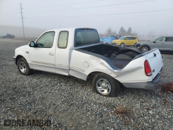 1997 Ford F-150 с VIN 1FTDX1728VNC50512, выставлен на аукционе Copart как лот 86523634 с пробегом 186 533 миль миль и Списание • Salvage title. История ставок и продаж доступна на DreamBid. Изображение 2.