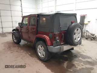 2008 Jeep Wrangler Unlimited Sahara z VIN 1J4GA59178L514002, wystawiony jako IAAI lot #41949717 z przebiegiem Nie podano mil oraz . Historia ofert i sprzedaży dostępna na DreamBid. Obrazek 3.