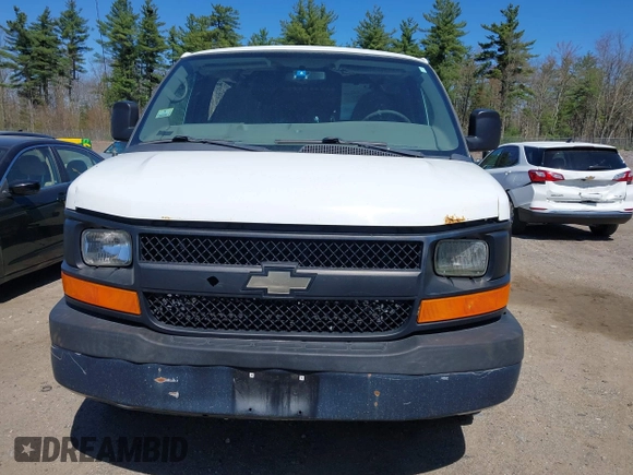 2014 Chevrolet Express Cargo Van with VIN 1GCWGFCA3E1130871, listed as a IAAI auction lot 42166083 with 279,624 mi miles. Bid and sale history available at carsss.com. Image 12.