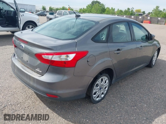 2012 Ford Focus SE with VIN 1FAHP3F28CL445832, listed as a IAAI auction lot 42380266 with 164,884 mi miles and . Bid and sale history available at DreamBid. Image 4.