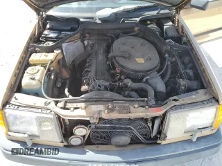 1986 Mercedes-Benz 300 300E with VIN WDBEA30D5GA296062, listed as a Copart auction lot 77434624 with 112,899 mi miles and Salvage Title. Bid and sale history available at carsss.com. Image 11.